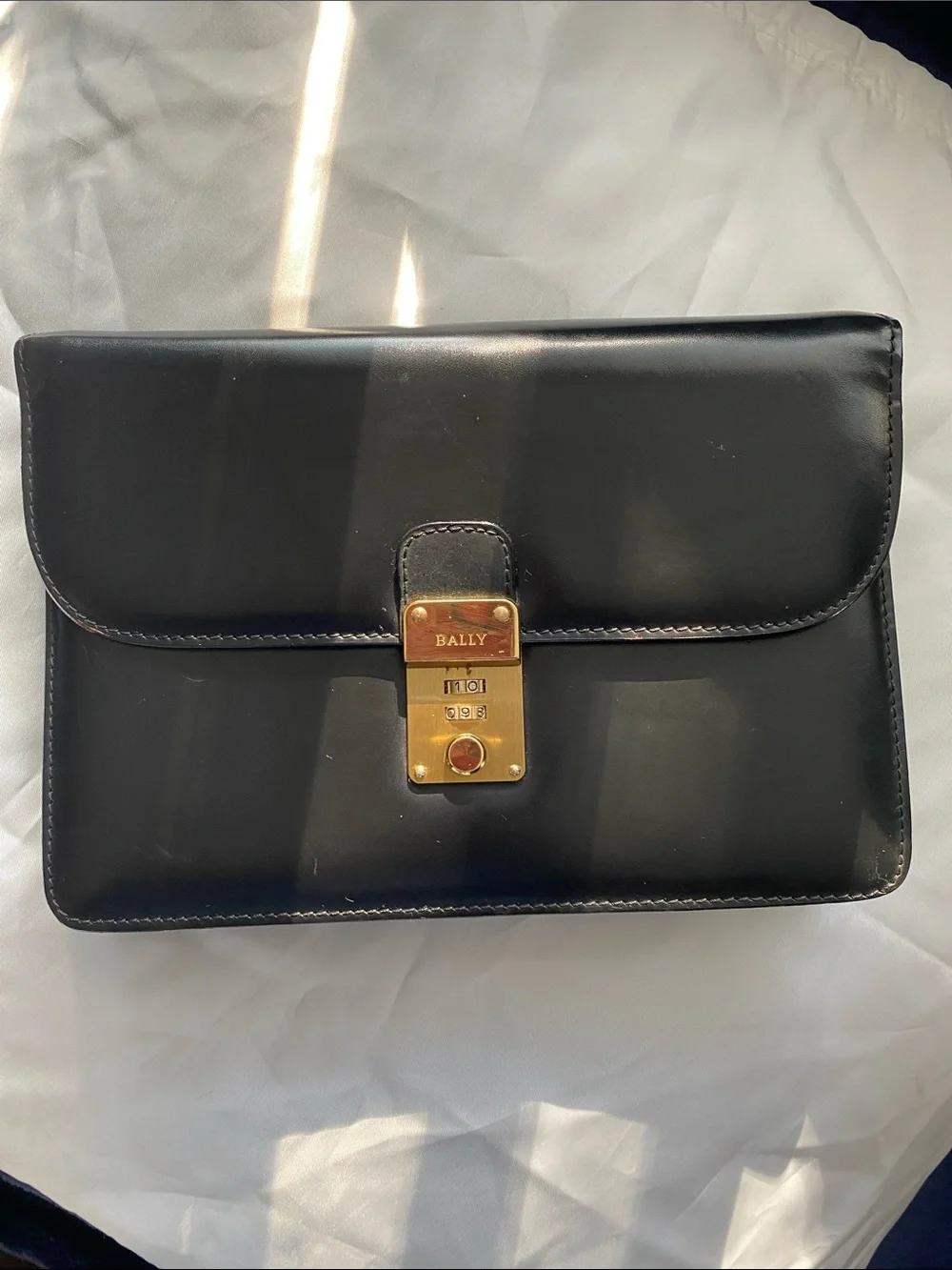 Bally Vintage Black Leather Clutch with Gold Lock and hidden strap